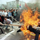 Angry Chinese protesters burn a dummy of US president Bill Clinton outside the Chinese embassy in Belgrade.